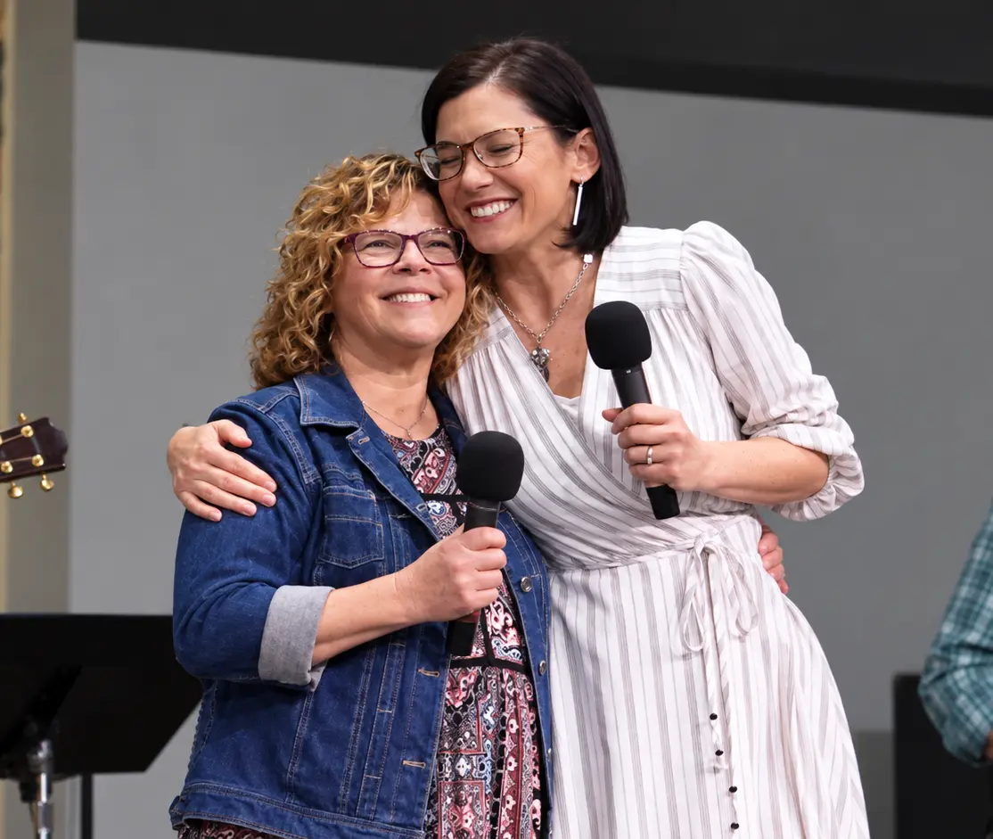 Deb and Sarah sharing a warm hug